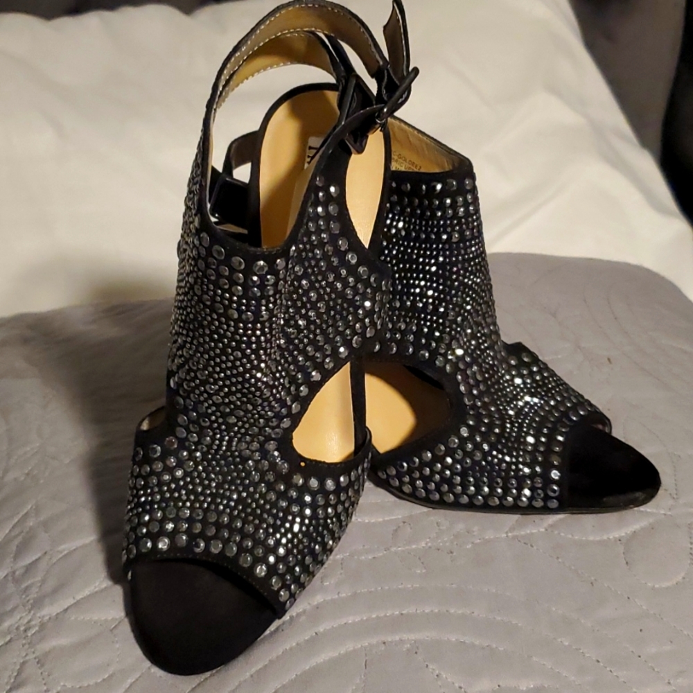 Black with silver stud heels, 2 buckles in the side,  great party shoe!